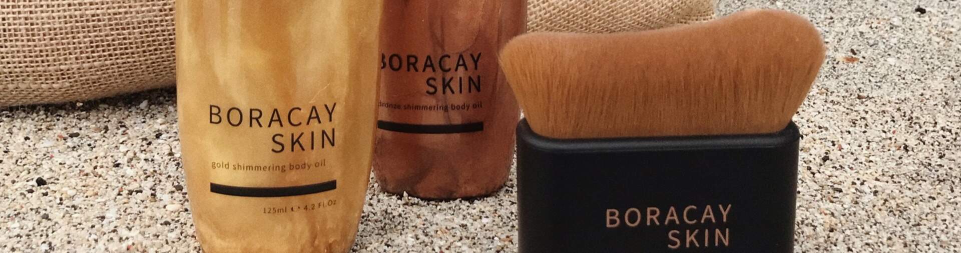 Kabuki brush with shimmering body oils