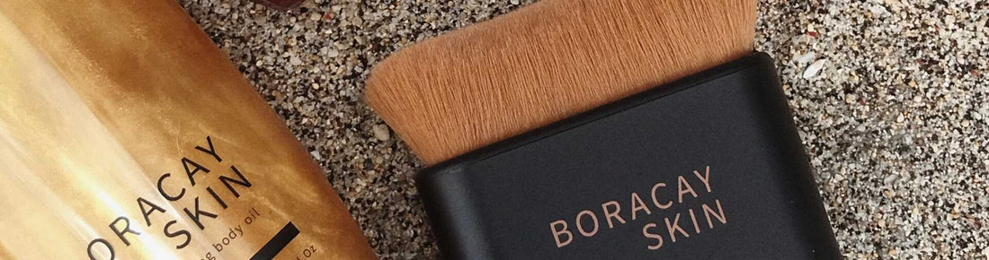 Kabuki brush and gold shimmering body oil