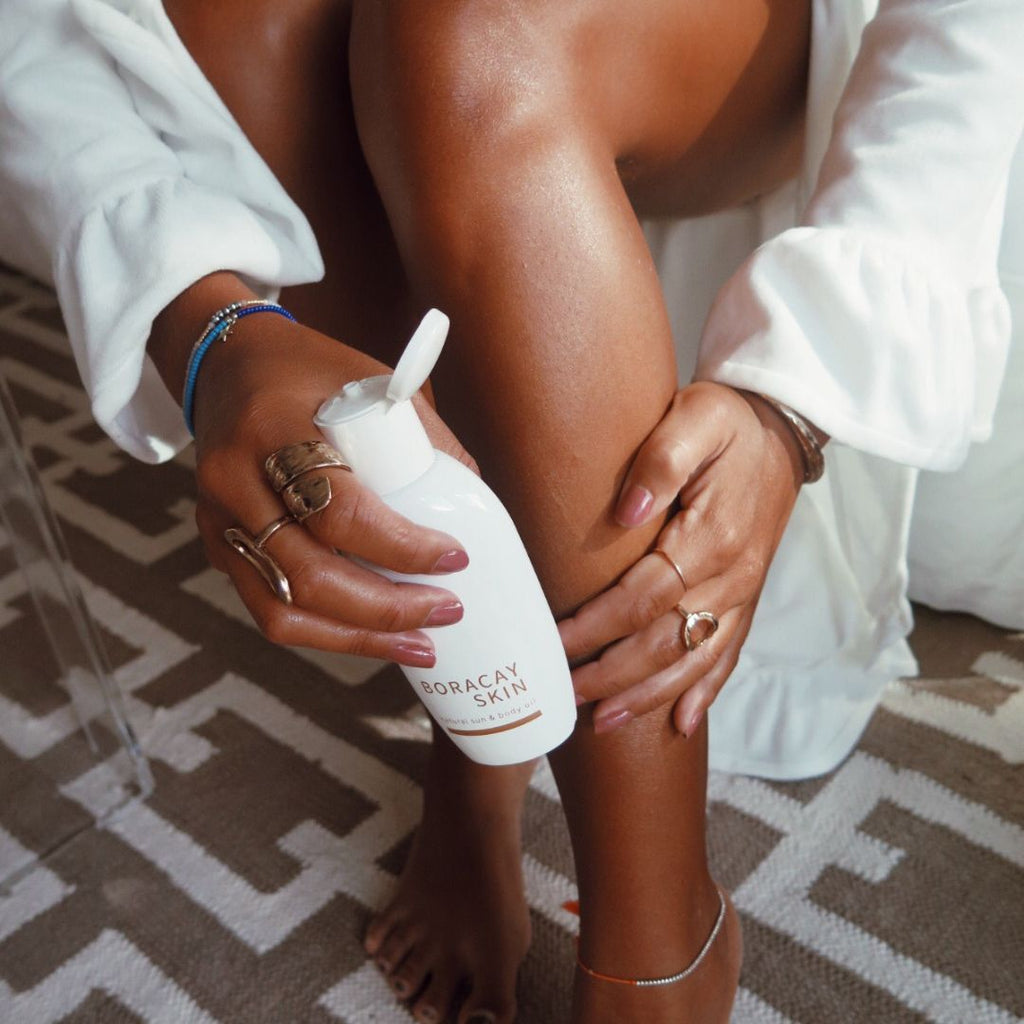 Boracay Skin Natural Sun and Body Oil being applied to leg