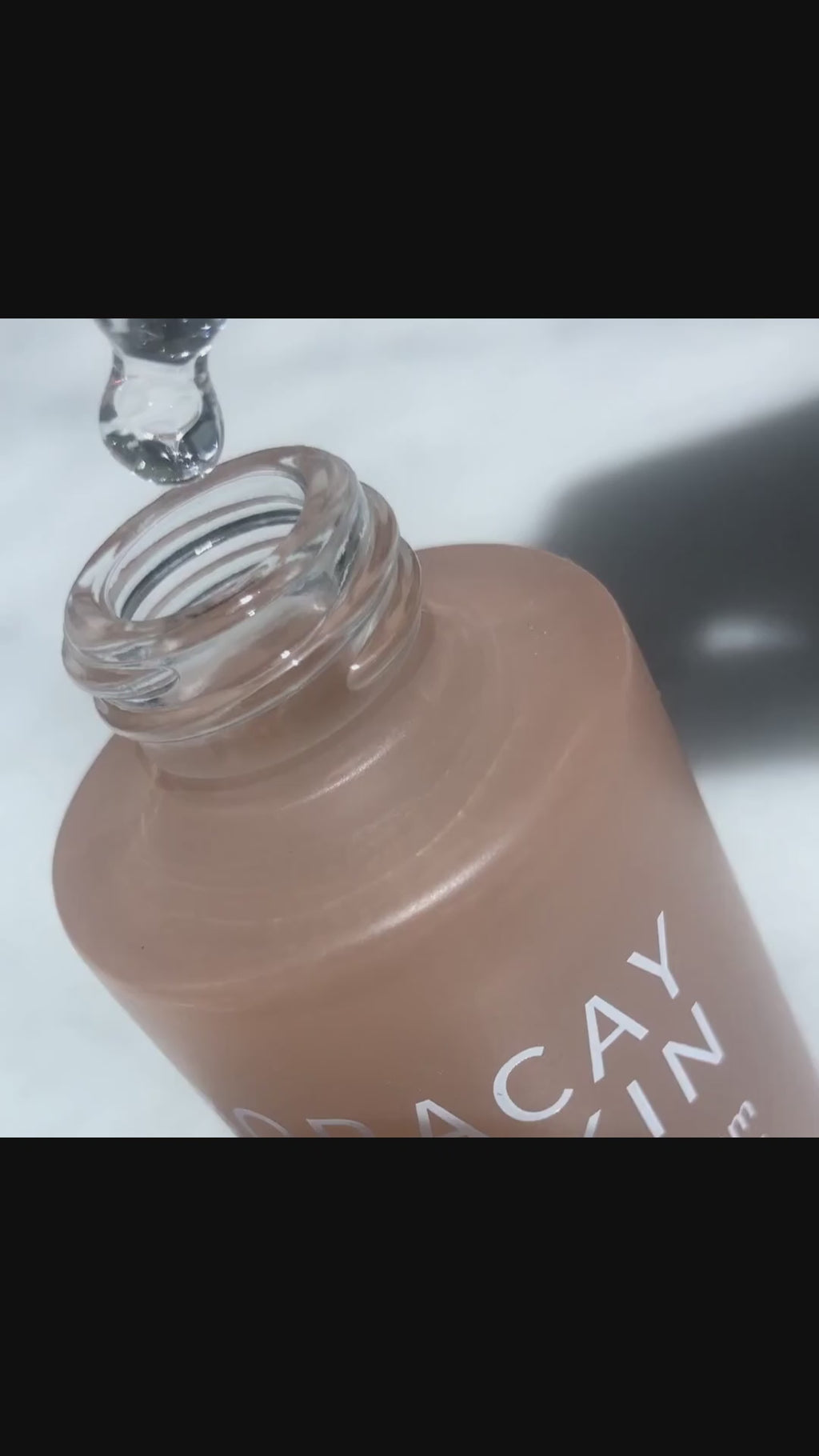 Video showing texture of Boracay Skin Hyaluronic Glow Serum with dropper dropping serum into bottle